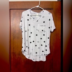 Brand new size Large white high-low v-neck shirt with stars